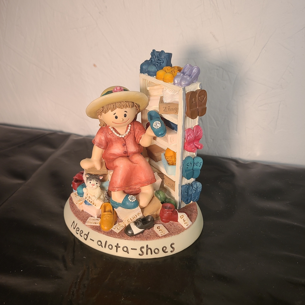 1999 Zingle-Berry "Need-alota-Shoes" figurine by Pavilion Gift Co